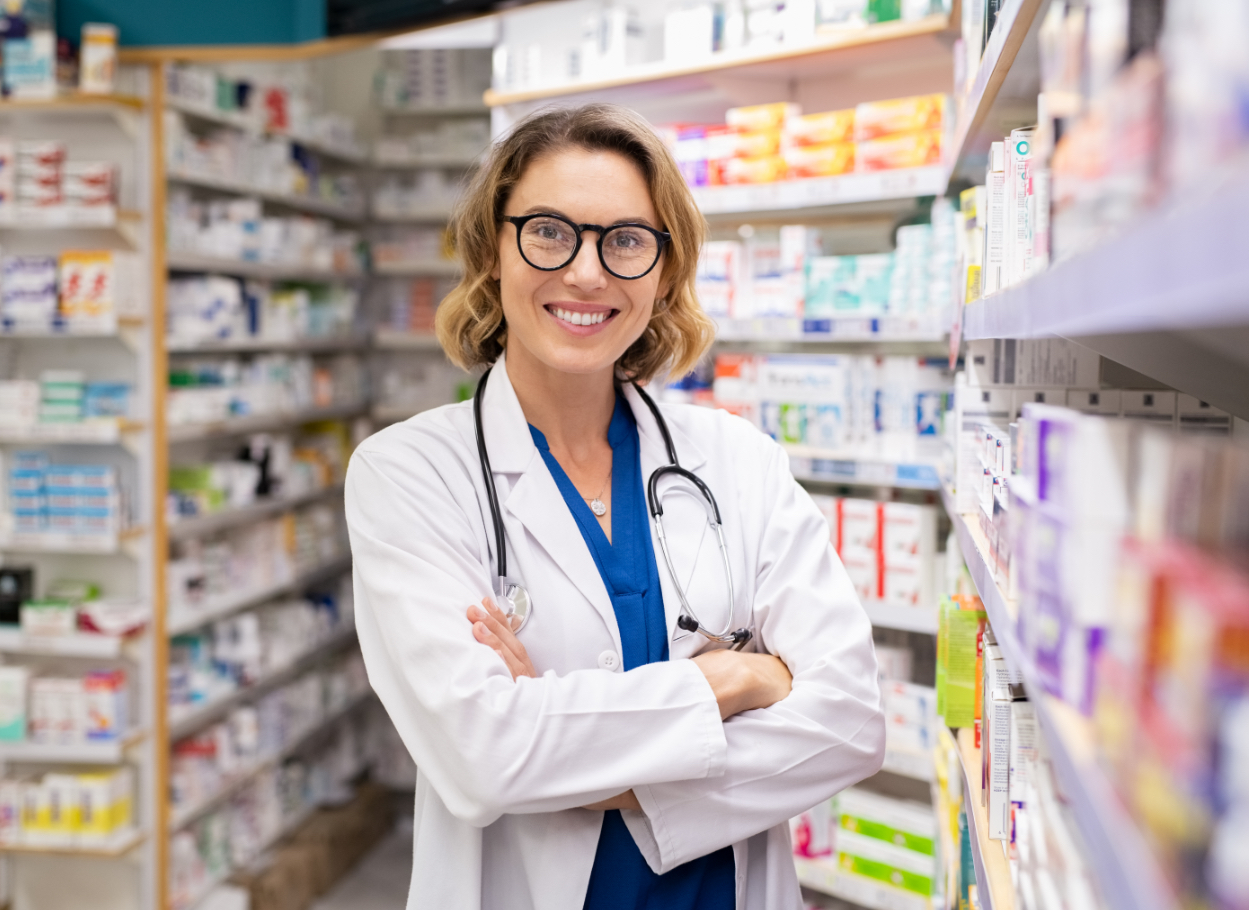 Female pharmacist in white coat – trusted Brooklyn pharmacy staff.